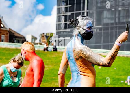 Amsterdam, Netherlands. 05th Sep, 2020. A model showcases the artwork done on her body during the Amsterdam Bodypaint Art Event.The Amsterdam Body Art Foundation is organizing the Amsterdam Bodypaint Art Event on the Museumplein for the fourth time on September 5, 2020. Several artists paint the various bodies of models to create a beautiful work of art. The theme this year is “Climate Awareness” thus the encouragement to artists to incorporate plants and animals in their artwork not leaving out the the elements in their creations. Credit: SOPA Images Limited/Alamy Live News Stock Photo