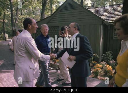 Jimmy Carter and Rosalynn Carter â€“ With President Anwar Sadat and Prime Minister Menahem Begin Greeting Each Other at the Camp David Summit ca.  7 September 1978 Stock Photo
