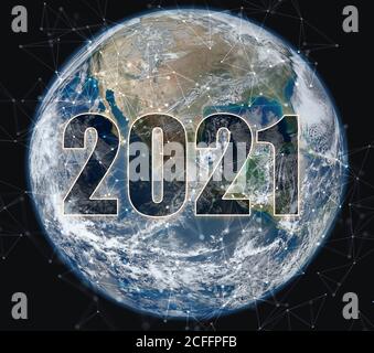 The number 2021 in space against the background of the planet earth. Year of high technologies and space development. Elements furnished by NASA Stock Photo