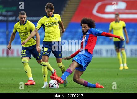 Crystal Palace's Jairo Riedewald (right) and Brondby's Jesper Lindstrom (left) battle for the ball during the pre-season friendly match at Selhurst Park, London. Stock Photo