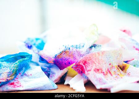 Bright purple blue pink colored crumpled soft sheet of paper on table Texas Stock Photo