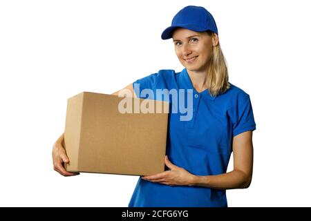 delivery woman in blue uniform holding cardboard box. isolated on white background Stock Photo