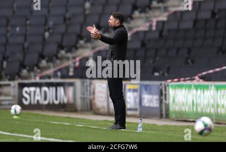 Milton Keynes Dons manager Russell Martin gestures on the touchline during the Carabao Cup first round match at Stadium MK, Milton Keynes. Stock Photo