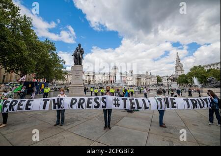 London, UK. 05th Sep, 2020. The remnants of an earlier newspaper protest join the others - Extinction Rebellion Citizens' Assembly in Trafalgar Square. The eased 'lockdown' continues for the Coronavirus (Covid 19) outbreak in London. Credit: Guy Bell/Alamy Live News Stock Photo
