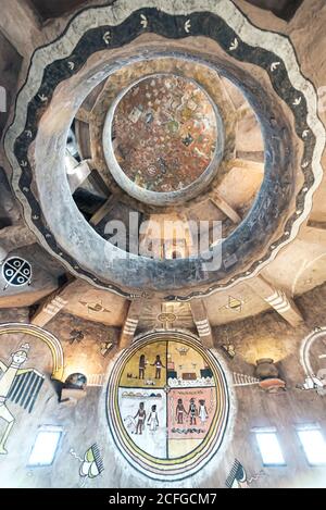 USA - May 5, 2017: From below multi-tiered figured arch decorated with patterns and drawings in museum Stock Photo