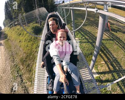 Summer toboggan run rodelbahn with many curves on a mountain