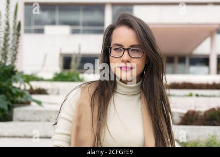 Pretty Woman in glasses looking away Stock Photo