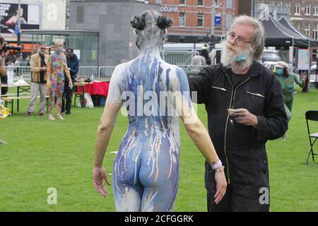 Amsterdam, Netherlands. 05th Sep, 2020. A model poses voluntarily for an artist during Body-paint Art at the Museumplein amid the Coronavirus pandemic on September 5, 2020 in Amsterdam, Netherlands The Body-paint Art Amsterdam promote body-paint and freedom of expression of the artists and models.(Photo by Paulo Amorim/Sipa USA) Credit: Sipa USA/Alamy Live News Stock Photo