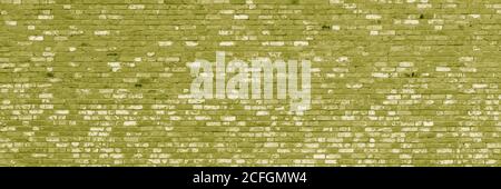 Chartreuse green brick building wall. Interior of a modern loft. Background for design. Stock Photo