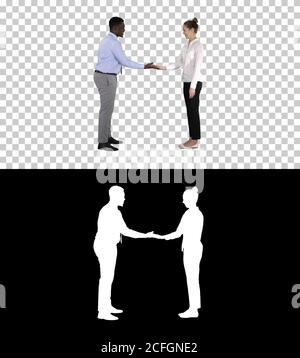 African man and caucasian woman giving low five, Alpha Channel Stock Photo
