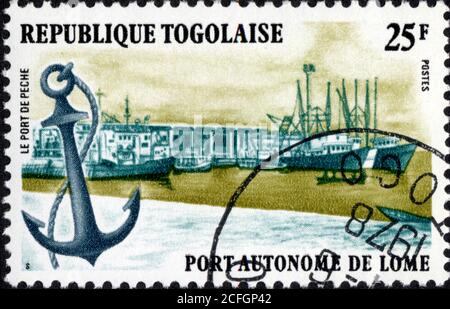 Timbre Port autonome de Lome. République Togolaise. Le port de pêche. 25 F Stock Photo