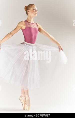 Emotional Female Ballet Dancer in Body Suit and Flying material Posing in  Dance in Various Poses Stock Photo by Gerain0812