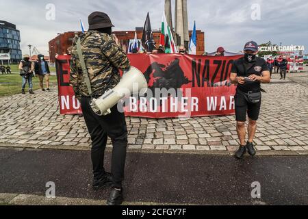 Gdansk, Poland. 5th Sep, 2020. The 'No more brother war' march participants are seen in Gdansk, Poland, on 5 September 2020 The march of the far-right, nationalist and racist organizations passed through the streets of the Gdansk city with a strong police escort. March participants chanted nationalist slogans as White Europe, White Life Matters, Scrap the Eu! etc. Credit: Vadim Pacajev/Alamy Live News Stock Photo