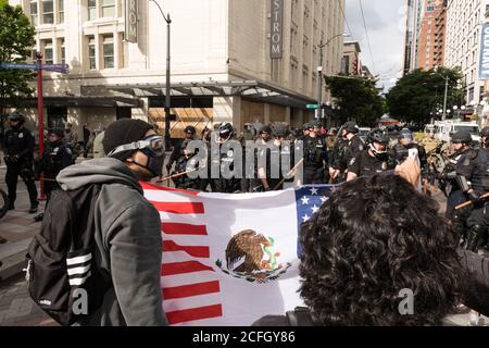 Seattle, USA - May 31, 2020: BLM protestors in Westlake park late in the day. Stock Photo