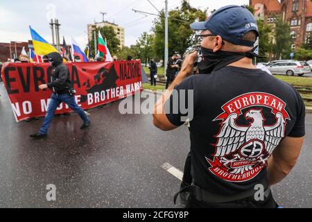 Gdansk, Poland. 5th Sep, 2020. The 'No more brother war' march participant wearing the European Brotherhood support 52 t-shirt is seen in Gdansk, Poland, on 5 September 2020 The march of the far-right, nationalist and racist organizations passed through the streets of the Gdansk city with a strong police escort. March participants chanted nationalist slogans as White Europe, White Life Matters, Scrap the Eu! etc. Credit: Vadim Pacajev/Alamy Live News Stock Photo