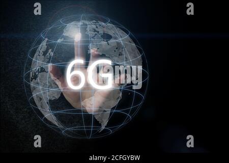 6G network digital hologram and internet of things on earth background.6G network wireless systems. 6G New generation telecommunication fast internet Stock Photo