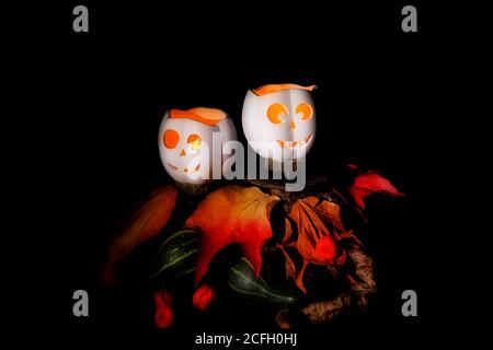 Two creepy pumpkins in the night Stock Photo