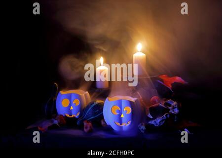 Two creepy pumpkins in the night Stock Photo