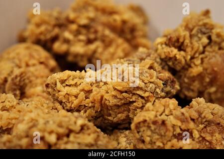 Pile of crispy kentucky fried chicken wings Stock Photo
