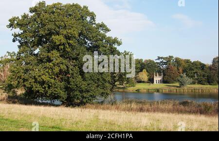 18th century Summerhouse by the lake in Burghley House Pleasure Gardens Stock Photo