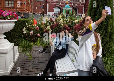 Moscow, Russia. 5th of September, 2020 People make a selfie on Manezhnaya Square during Moscow City Day celebrations, Russia Stock Photo