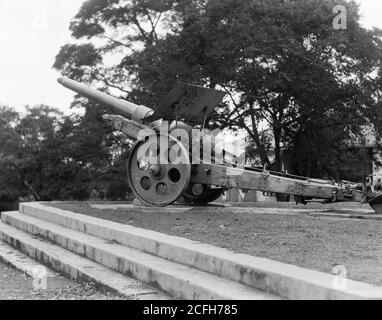 'Original Caption:  Uganda. Entebbe. German gun on Park Square removed from the German cruiser ''Emden''  - Location: Uganda--Entebbe ca.  1936' Stock Photo
