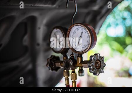 manometers measuring equipment for filling air conditioners car,gauges. Stock Photo