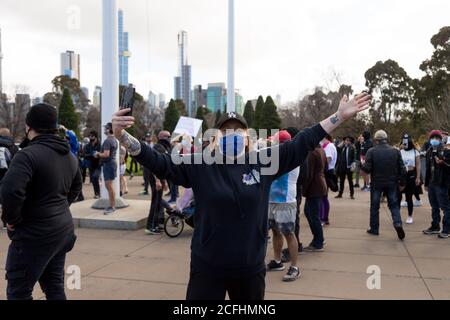 Melbourne, Australia, 5 September, 2020.  A woman yells at police closing in on her during the Melbourne Freedom Protest, Phillip Island Circuit, Australia. Credit: Dave Hewison/Alamy Live News Stock Photo