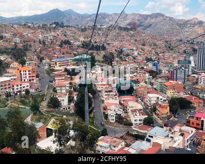 Aerial view on La Paz city, bolivian capital. Cable Car. Mi Teleferico is aerial cable car urban transit system serving the La Paz–El Alto in Bolivia. Stock Photo