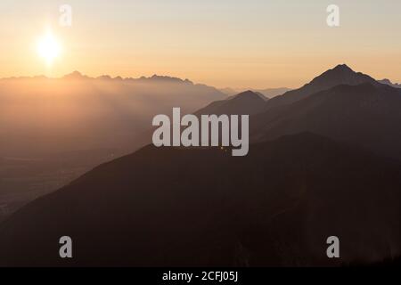 Amazing view of Triglav and Julian Alps at sunset from Krvavec, Slovenia Stock Photo