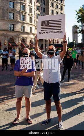 Boston, USA. 05th Sep, 2020. Rally for Black Lives, Black Voices & Jacob Blake.  Boston, MA, USA. Copley Square.  More than 500 gathered in Copley Square, in front of Trinity Church in central Boston on Sept. 5th  2020 in support of Black Lives Matter. Photo shows two Caucasian men on Copley Square during the Rally Credit: Chuck Nacke/Alamy Live News Stock Photo