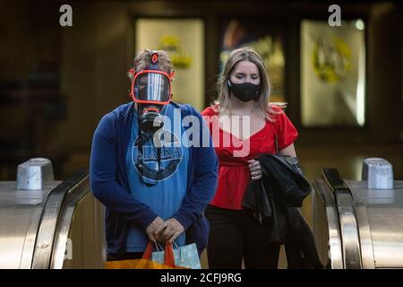 London, UK. 6th September 2020. Coronavirus: Face coverings continue to be enforced on underground transport. Man with gas mask seen entering Canada Water station. Credit: Guy Corbishley/Alamy Live News