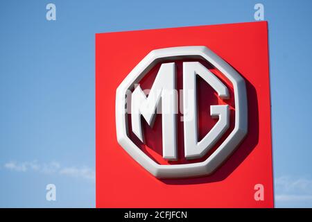 A MG car garage sign. Stock Photo