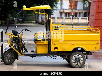 Electric powered pick up van parked on the side of a street. Electric vehicles are becoming more popular as being zero emission and give faster return Stock Photo