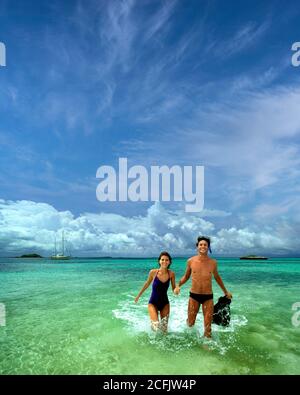 TRAVEL CONCEPT: Couple at Grand Cay in the Bahamas Stock Photo
