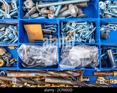 Working tool plastic case with bolts and nuts. Stock Photo