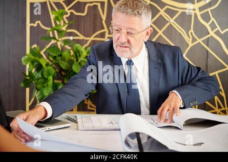 Examining project documentation Stock Photo