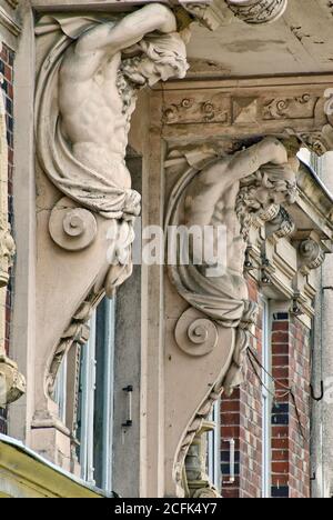 Atlantid hemi-figures supporting a balcony at house at Rynek (Market Square) in Ząbkowice Śląskie in Lower Silesia region, Poland Stock Photo