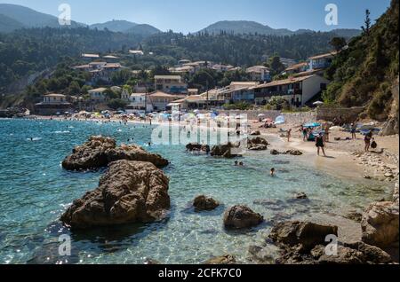 Tourists enjoying their summer holiday relaxing and having fun on this beautiful resort. Stock Photo