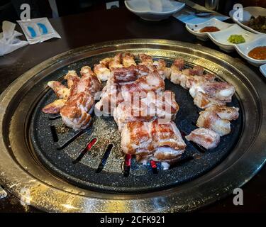 https://l450v.alamy.com/450v/2cfk921/samgyeopsal-grilled-pork-belly-and-moksal-grilled-pork-neck-popular-in-south-korea-good-balance-of-meat-and-fat-favorite-korean-food-2cfk921.jpg