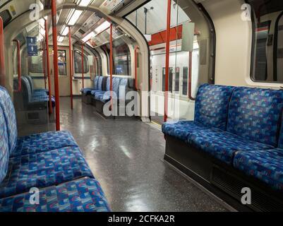 Government advice the people should only use public transport for essential travel only have resulted in empty train carriages at quiet times. Stock Photo