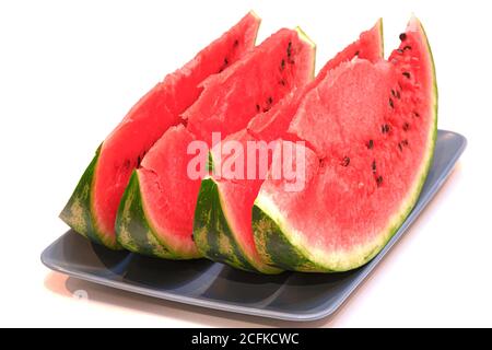 Close-up of watermelon slices on a white background. Stock Photo