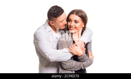 Close up millennial couple in love. Portrait of a couple planning a happy future. Holding couple in love. Isolated on white Stock Photo