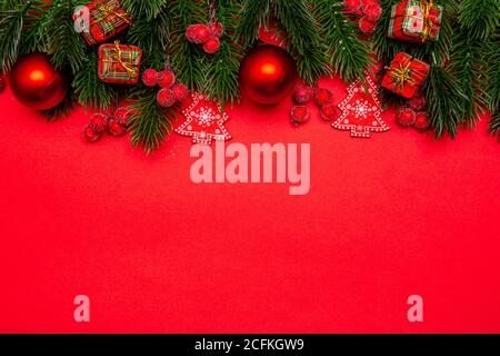 https://l450v.alamy.com/450v/2cfkgw9/holiday-christmas-background-festive-composition-for-the-christmas-new-year-holiday-season-red-decorations-and-pine-branches-with-copy-space-2cfkgw9.jpg