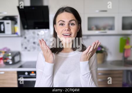 Video call, conference young woman looking at webcam, talking Stock Photo