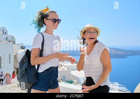 Mother and teenage daughter traveling together, luxury travel, island Santorini Stock Photo