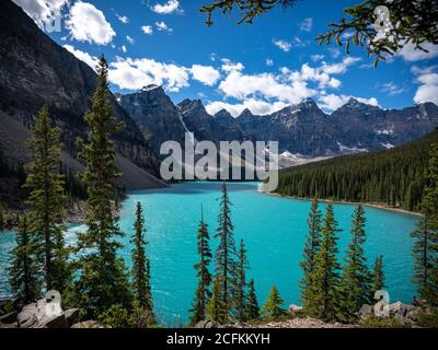 Moraine Lake with sunny blue sky mid day. Stock Photo