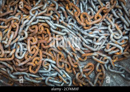 rusty chain in cage of iron concept for industry background Stock Photo