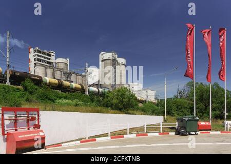 Russia, Krasnodar region, Verkhnebakansky settlement - June 12, 2018: LUKOIL gas Station near the production facilities of the Verkhnebakansky cement Stock Photo