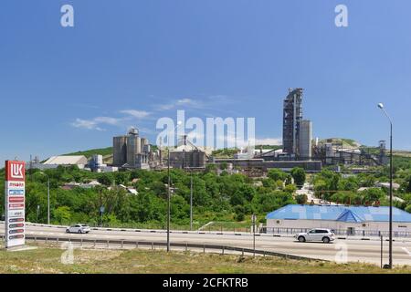 Russia, Krasnodar region, Verkhnebakansky settlement - June 12, 2018: Production buildings of the city-forming enterprise Verkhnebakansky cement plant Stock Photo